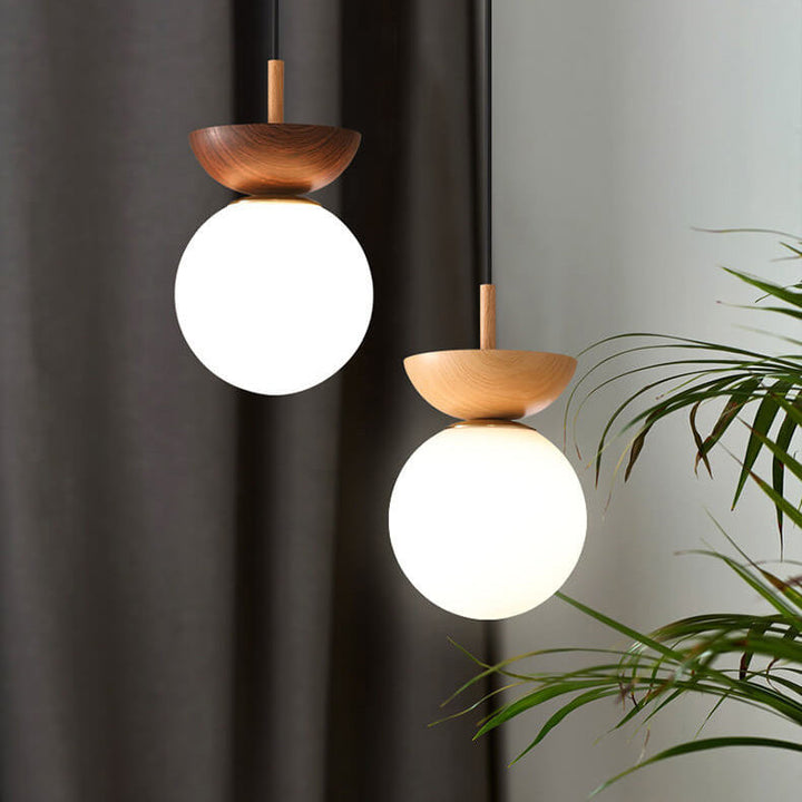 Walnut wood LED ceiling fixture. Modern spherical design, ideal for hallway decor.