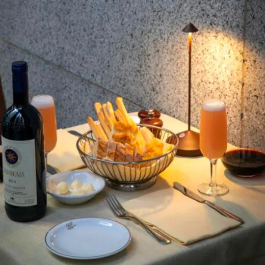 Waterproof Serenity LED table lamp, rechargeable for patio or garden, enhancing outdoor ambiance.