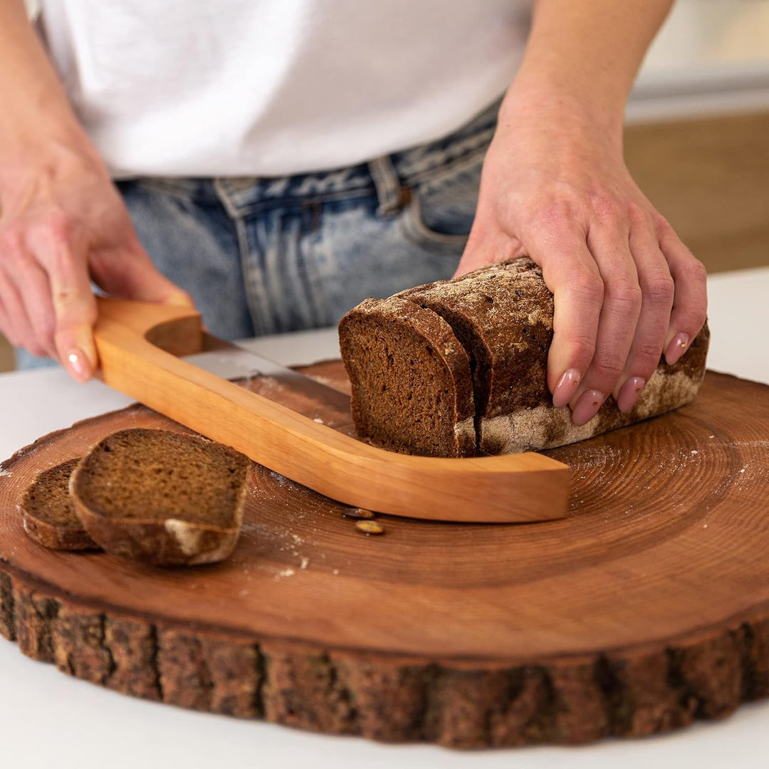Serrated stainless steel bread knife, SlicePerfect, for effortless slicing of homemade loaves. Ergonomic kitchen essential.