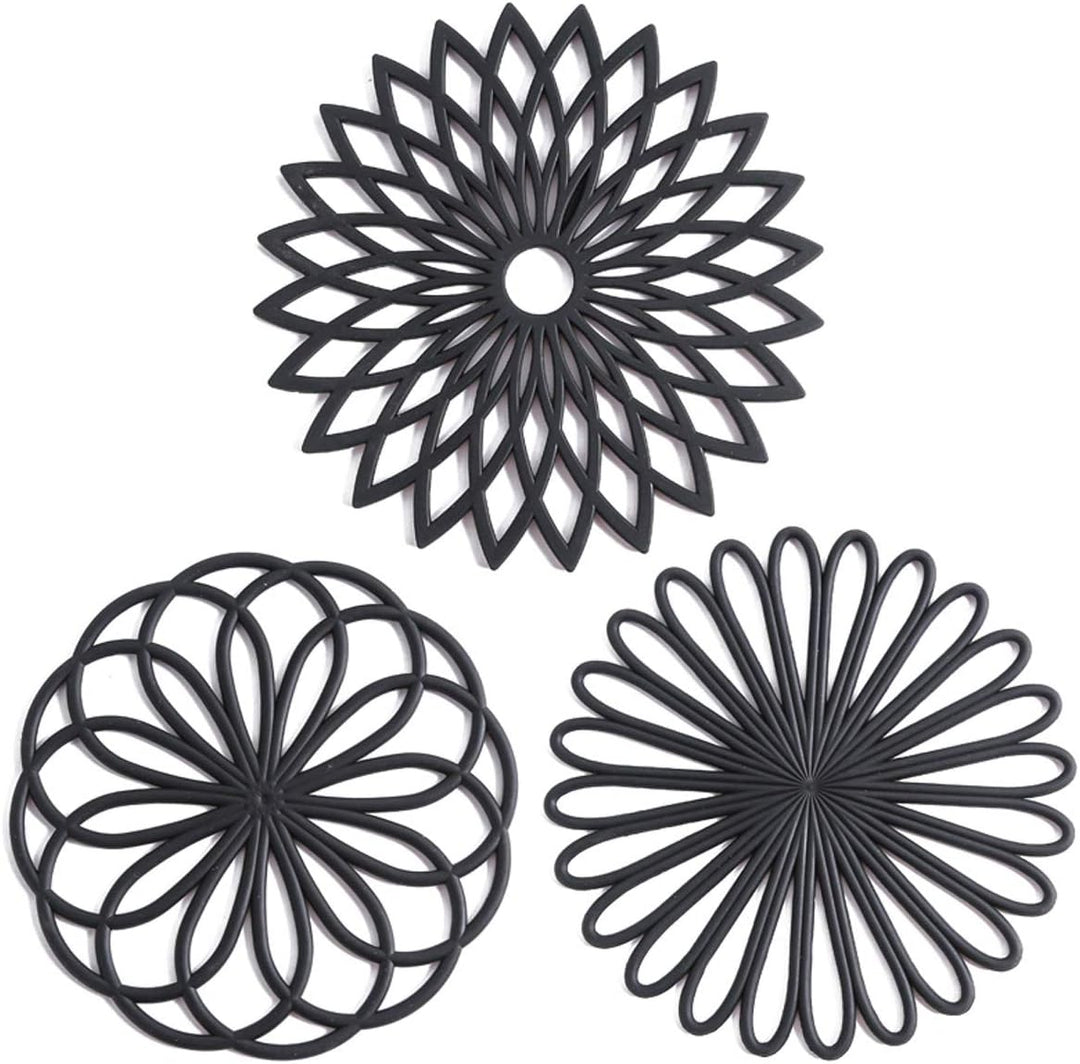 Set of 3 heat resistant silicone coasters in vibrant colors, protecting surfaces from hot items