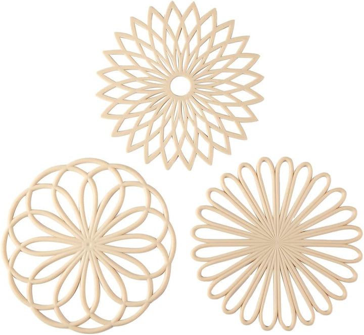 Modern set of three silicone heat resistant coasters, versatile for kitchen and dining areas