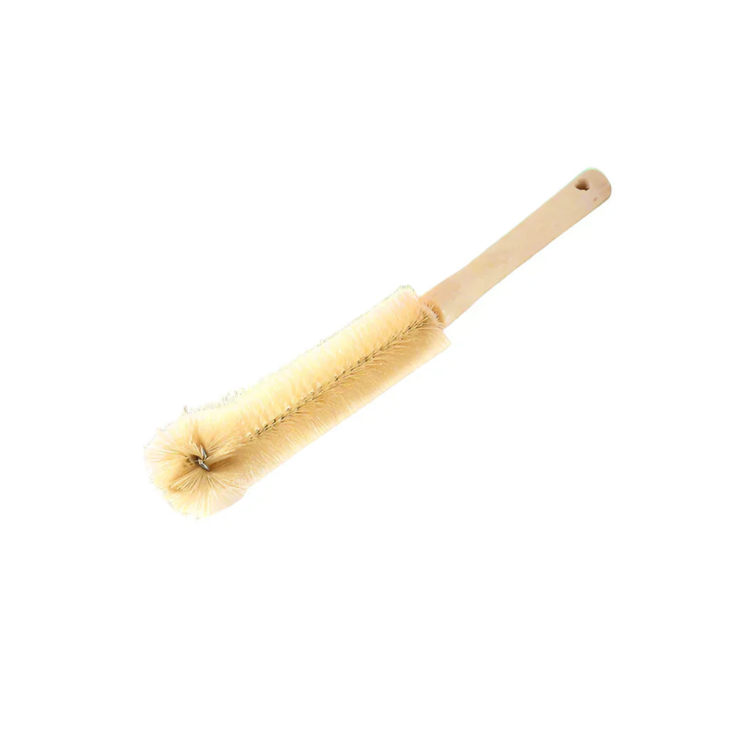 Detail of a long-handled wooden bottle brush, showcasing its ergonomic design for jar cleaning.