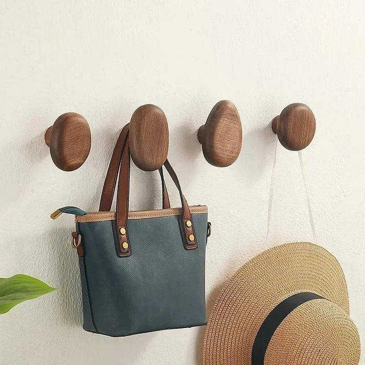 Entryway decor: Set of natural wood pebble wall hooks for coats & keys. Modern & functional wall organization.