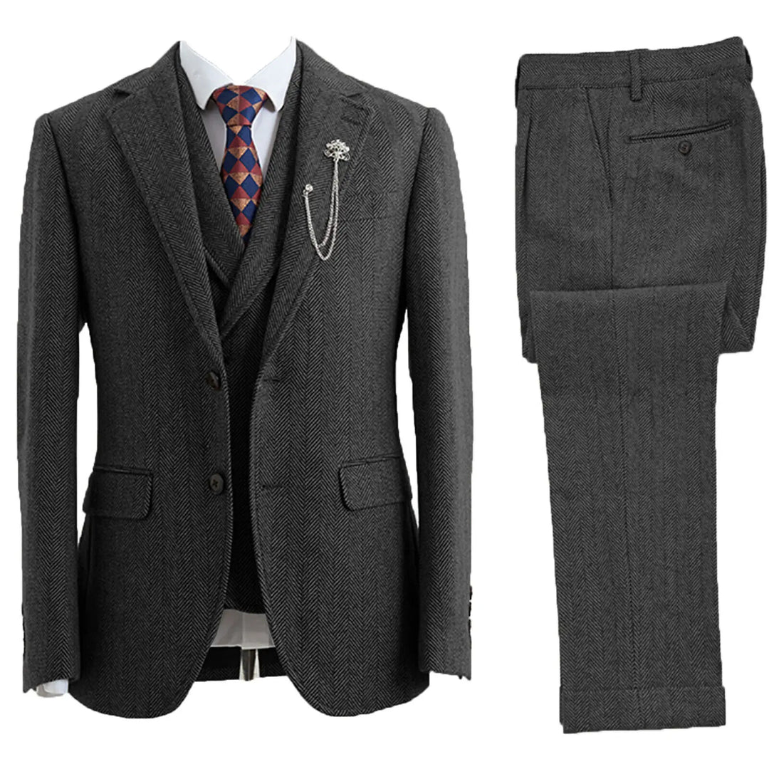 Close-up of the Leonard men's herringbone suit fabric, showcasing the distinctive pattern and quality menswear.