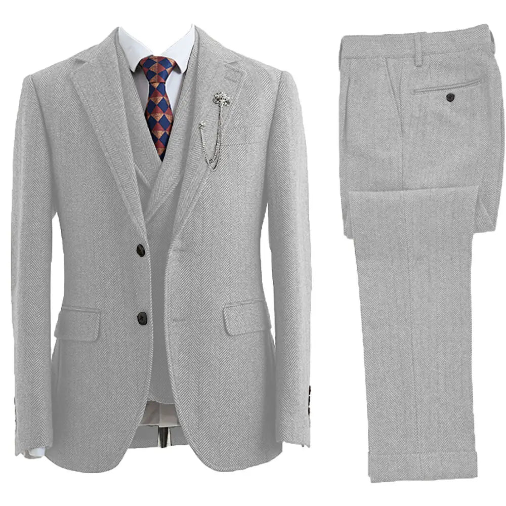 Elegant men's 3-piece herringbone wedding suit. Classic formal wear for a sophisticated groom or special occasion.