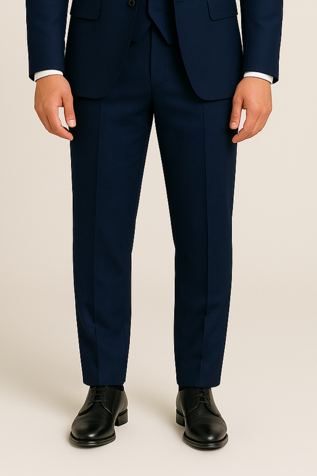 Gentlemen's navy three-piece suit. Sharp, tailored formal wear for sophisticated style at weddings and business.