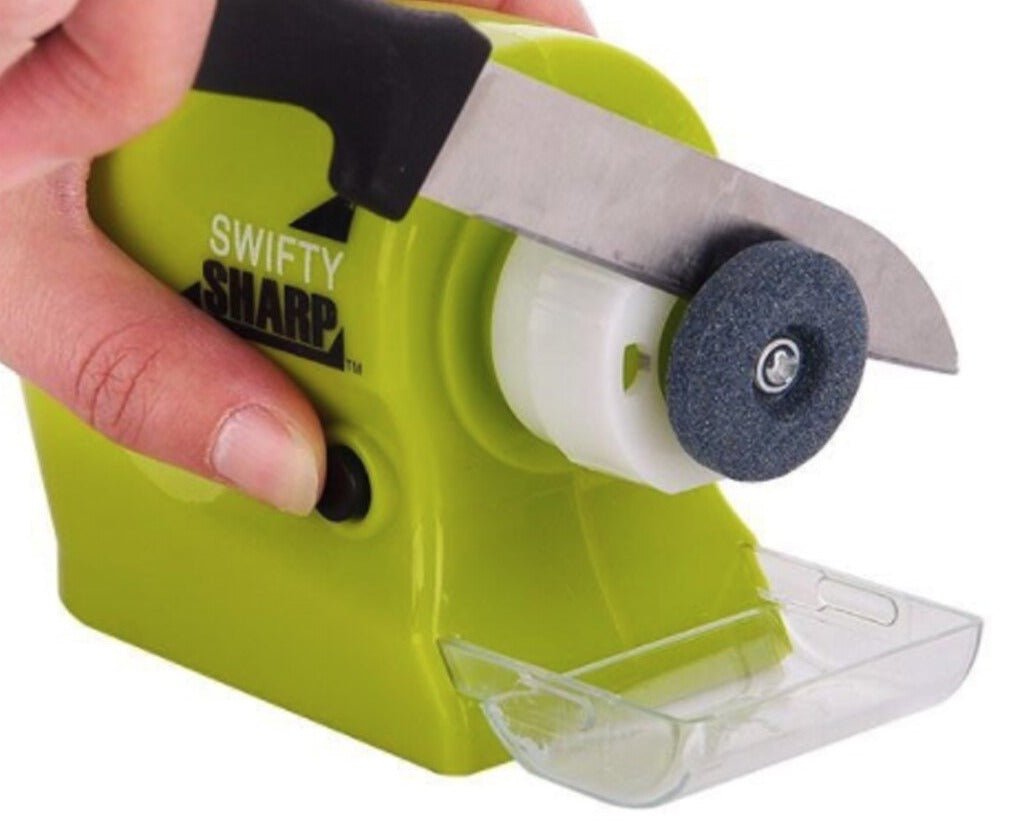 Electric knife sharpener with precision guides, sharpening a chef's knife. Essential kitchen gadget for sharp blades.