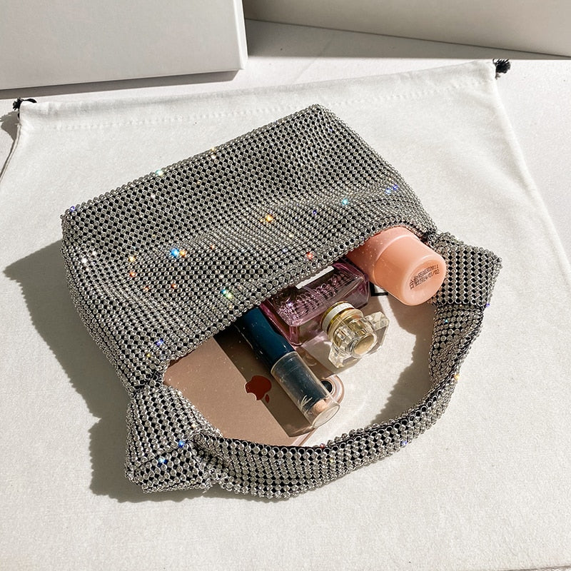 Elegant women's rhinestone evening handbag, a stunning sparkly clutch for festive parties.