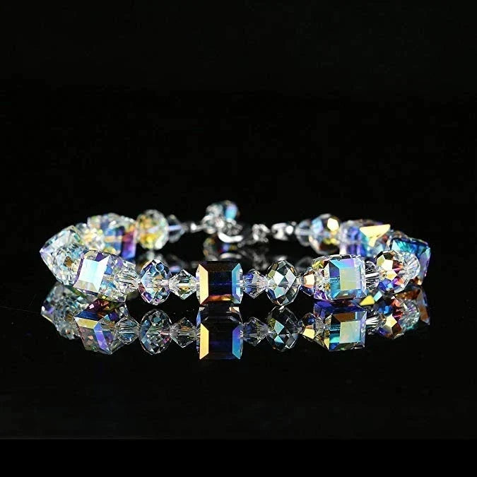 Elegant women's silver bracelet featuring sparkling cubic zirconia crystals, perfect accessory.