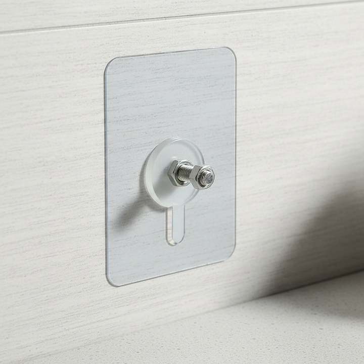 Shiny silver self-adhesive bathroom hooks on a white tiled wall, drill-free storage solution.