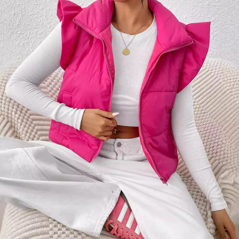 Short padded women's gilet vest, perfect for fall layering & warmth. Sleeveless quilted outerwear.