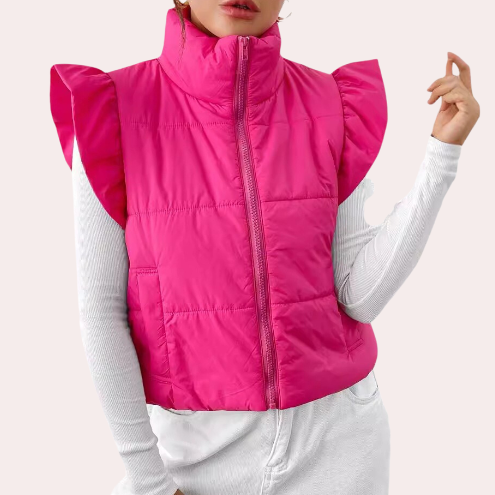 Versatile women's short gilet, a padded vest for easy layering. Essential fall fashion outerwear.