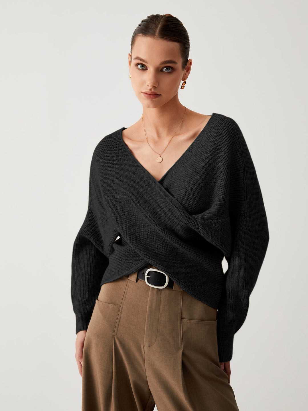 Trendy sienna oversized women's sweater, warm and cozy knitwear essential for cold weather style.