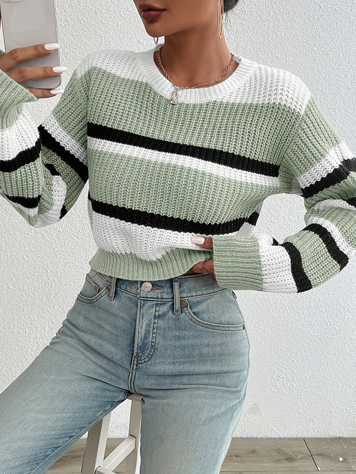 Stylish women's Sienna sweater, soft knitted fabric, great for cozy fall and winter outfits.