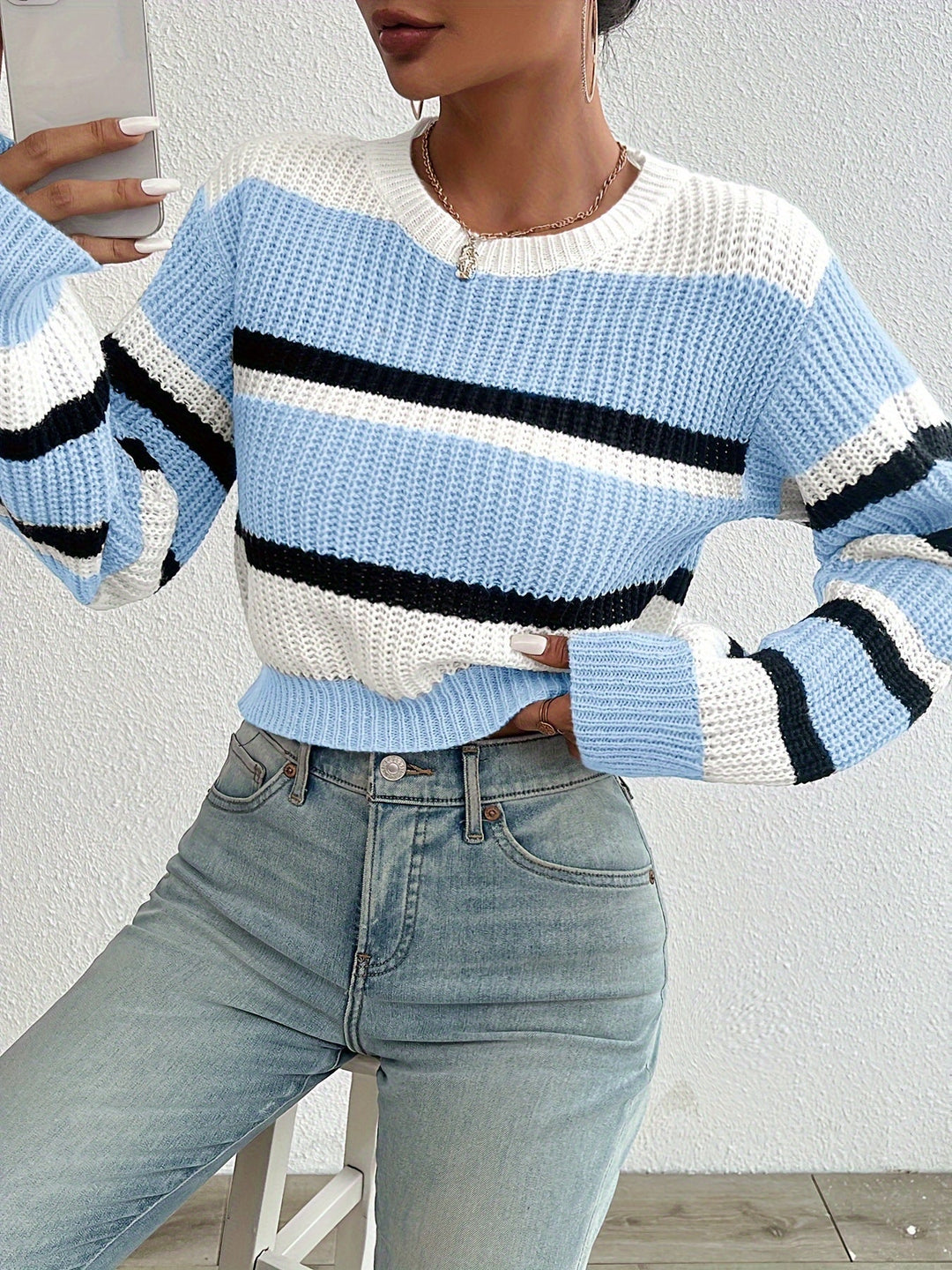 Relaxed fit Sienna knitted sweater for women, comfortable long sleeve, perfect casual winter top.