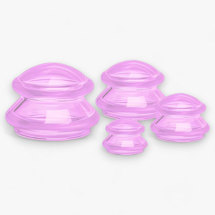 Hand holding a silicone cupping tool, demonstrating cellulite reduction therapy on a woman's thigh.