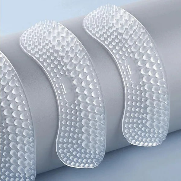 Clear silicone heel inserts designed for foot comfort, preventing blisters and rubbing in any shoe.