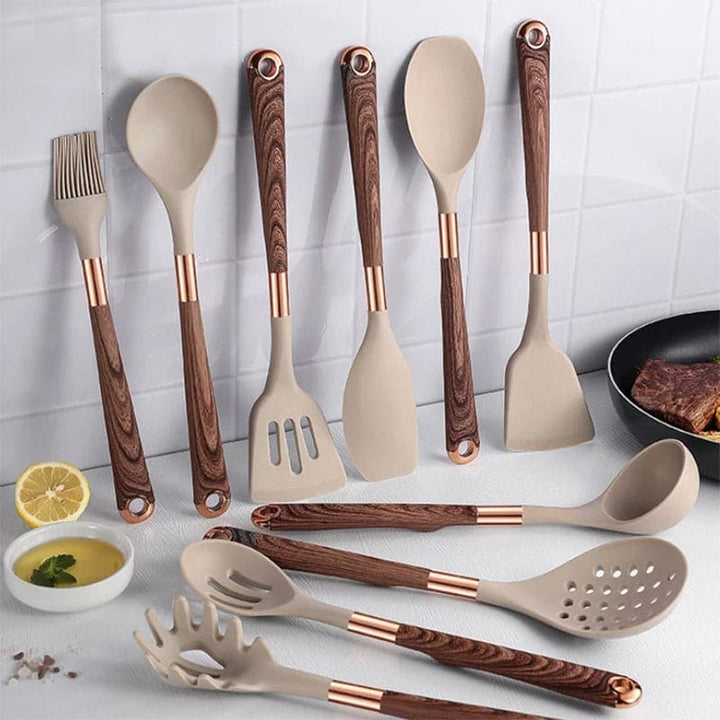 Heat-resistant silicone and wood kitchen utensil set, safe for non-stick cookware.