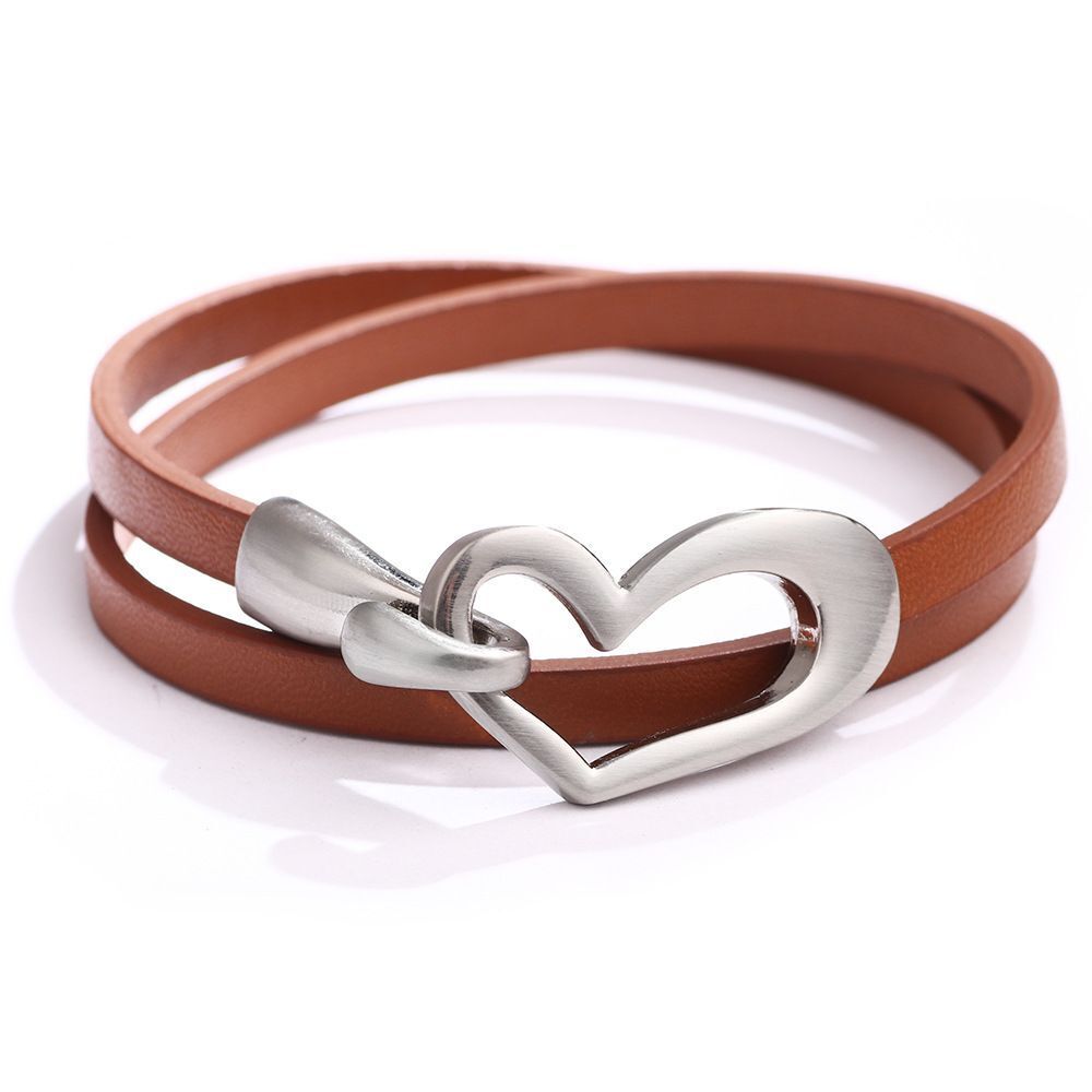 Elegant women's leather heart bracelet, a delicate fashion accessory. Perfect for daily wear.