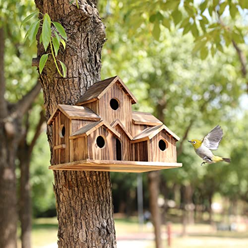 Decorative wooden birdhouse for gardens, featuring six entrances for multiple bird families nesting.