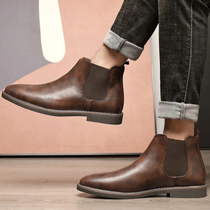 Modern men's fashion: pull-on ankle boots, a comfortable and sleek chelsea boot for any outfit.