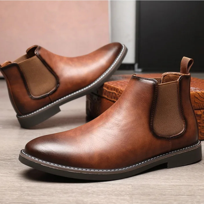 Durable men's chelsea boots; brown leather for a classic look, offering comfort and effortless style.