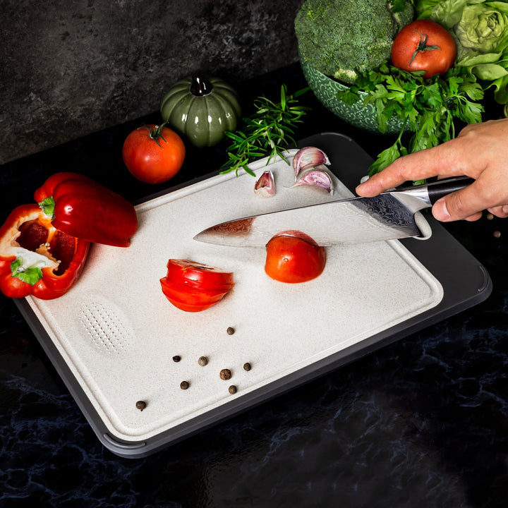 Hygienic SteelSafe stainless steel cutting board, non-porous for ultimate food safety & easy cleaning.