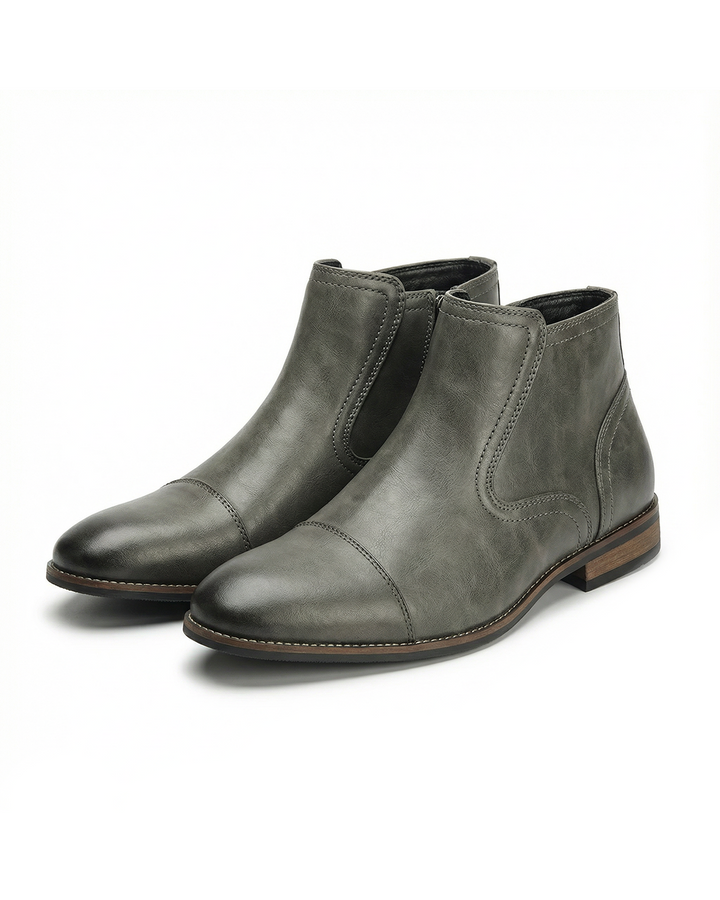 Sleek men's black side-zip Chelsea boots, perfect for stylish comfort & versatile wear.