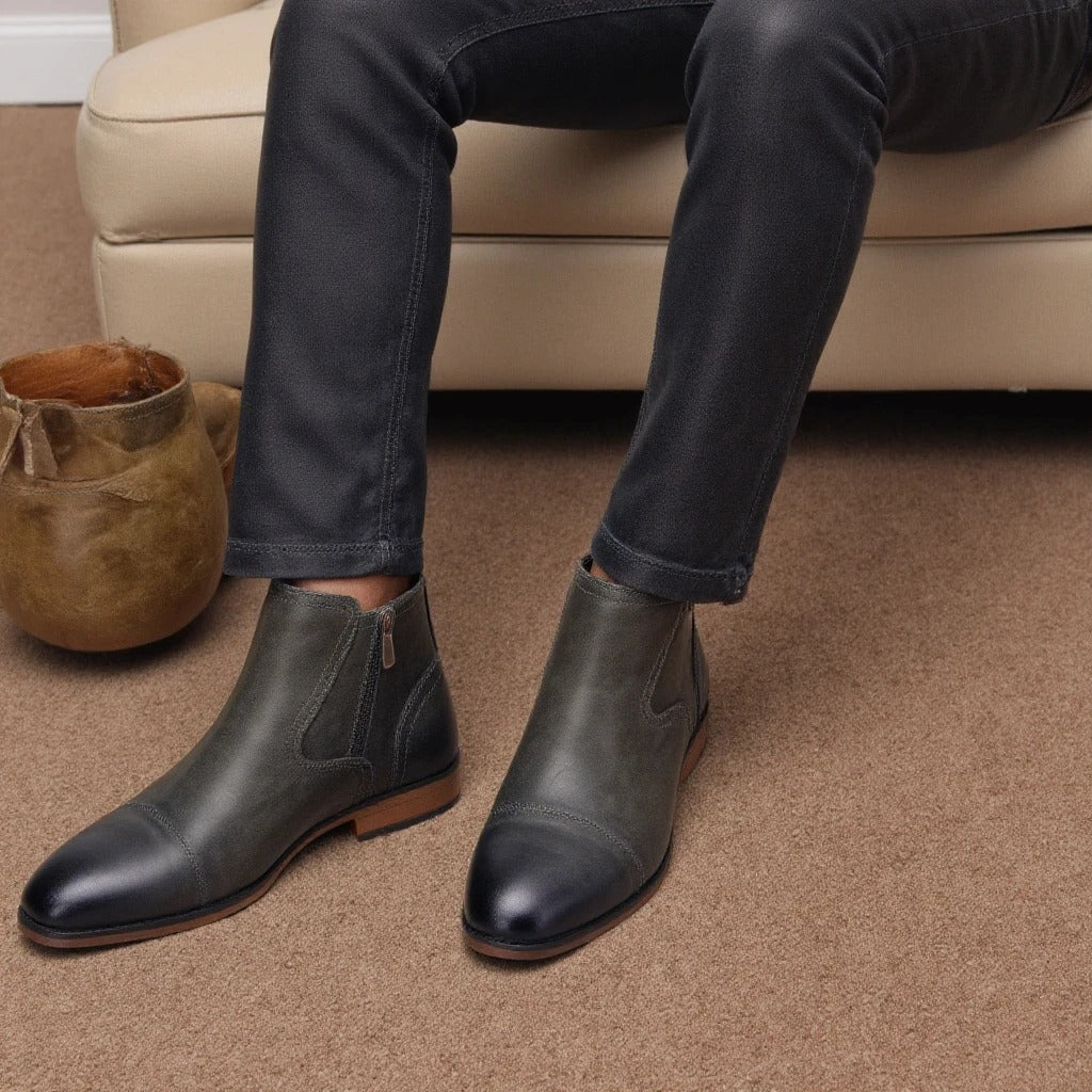 Professional men's leather side-zip Chelsea dress boots, perfect for smart formal attire.
