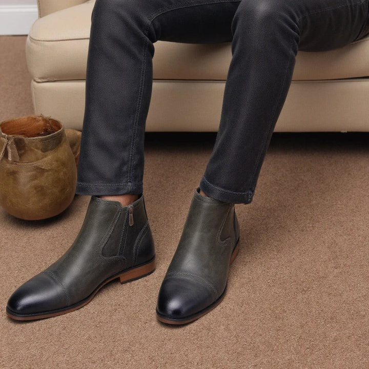Professional men's leather side-zip Chelsea dress boots, perfect for smart formal attire.