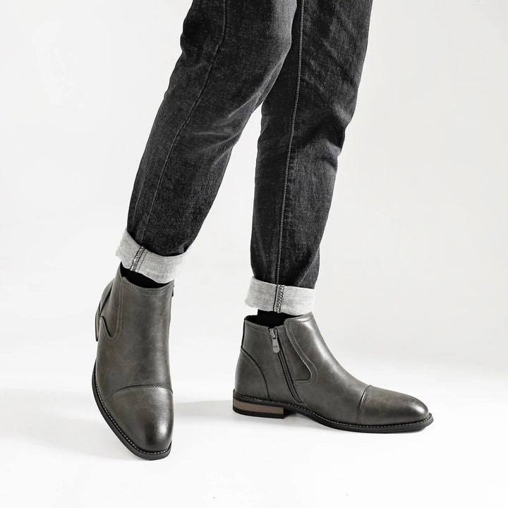Elegant men's side-zip Chelsea dress boots, offering sophisticated style and easy wear.