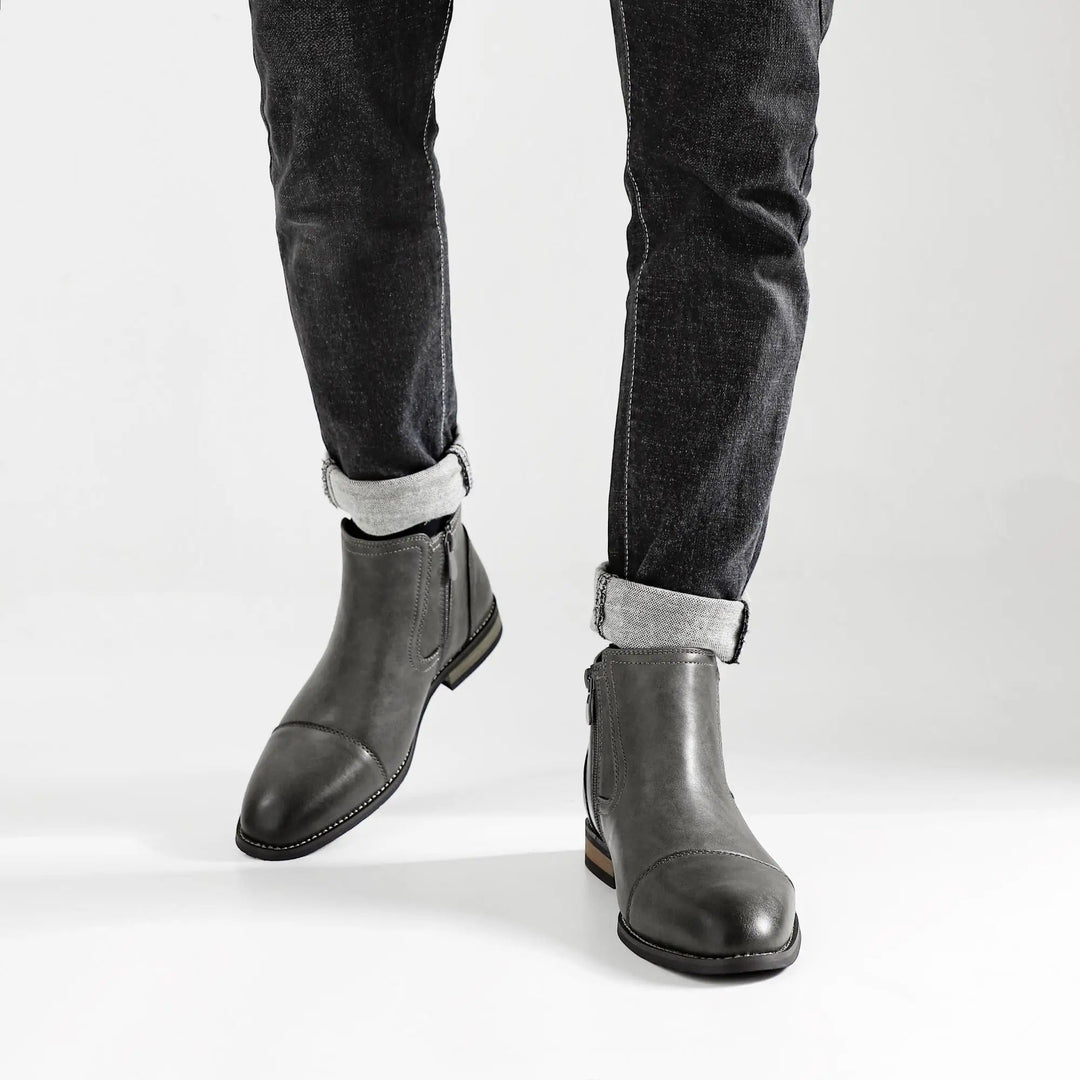 Premium brown leather men's Chelsea boots, sleek design with practical side-zip.