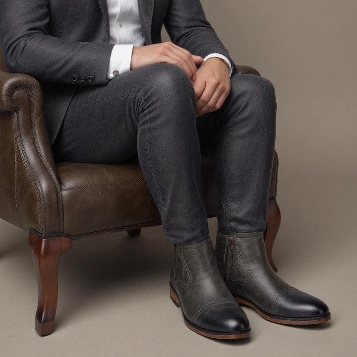 Everyday men's fashion black Chelsea boots featuring a convenient and sleek side-zip.