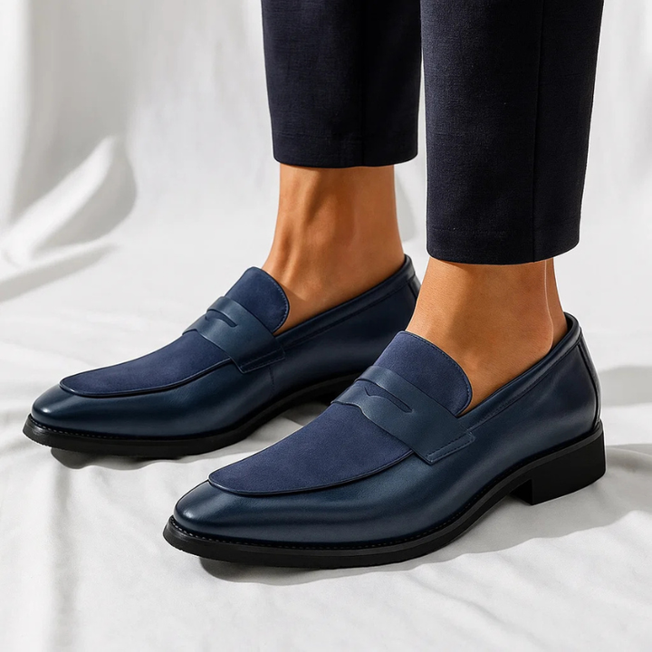 Navy blue men's penny loafers, comfortable slip-on dress shoes for a polished, stylish business casual look.