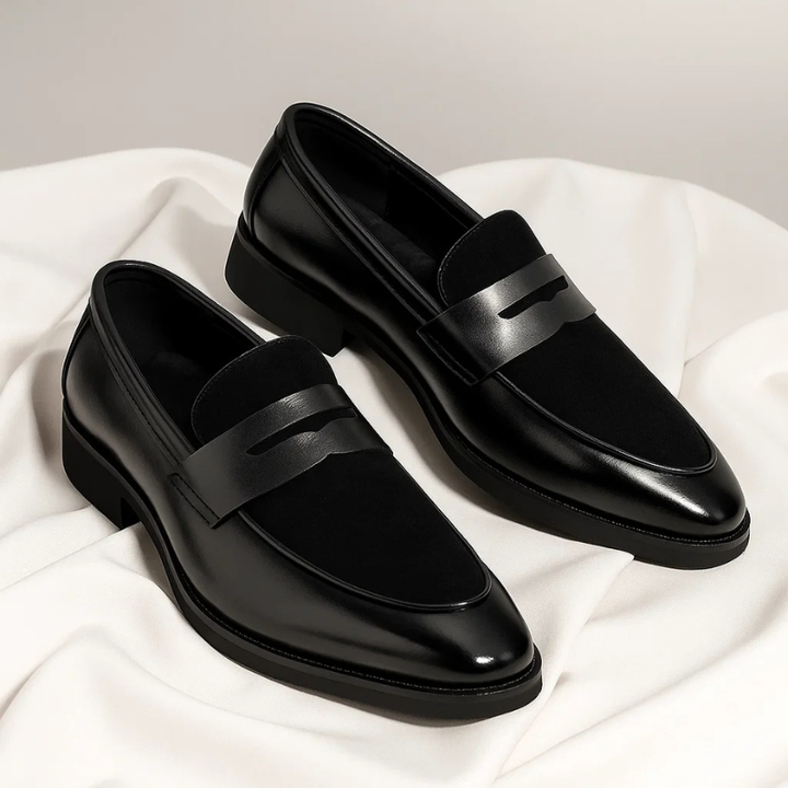 Stylish men's penny loafers in premium leather, offering everyday sophistication for modern business casual outfits.