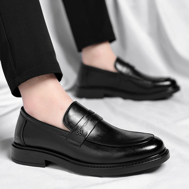 Casual men's slip-on loafers featuring everyday comfort & classic design. Sleek footwear for versatile style.