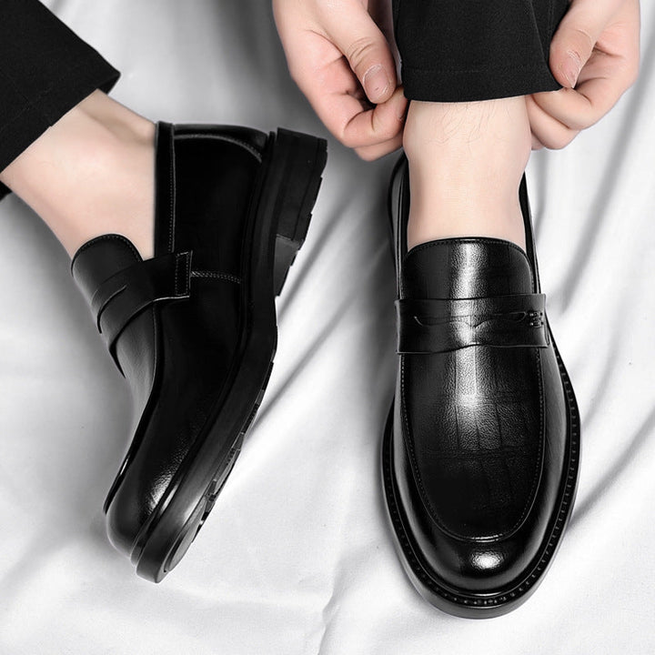 Comfortable men's penny loafers, perfect for everyday style. Sleek slip-on design for versatile casual wear.