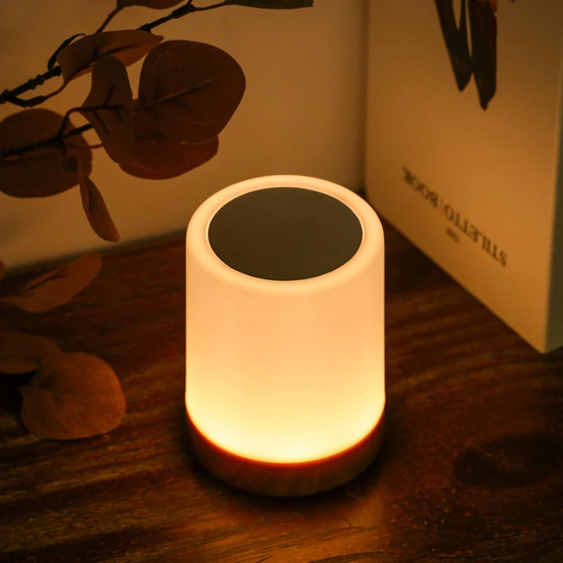 Sleek modern dimmable LED night light with touch control, perfect for bedside ambient lighting and home accent.