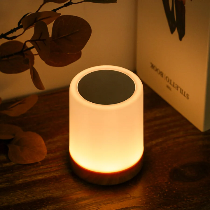 Sleek modern dimmable LED night light with touch control, perfect for bedside ambient lighting and home accent.
