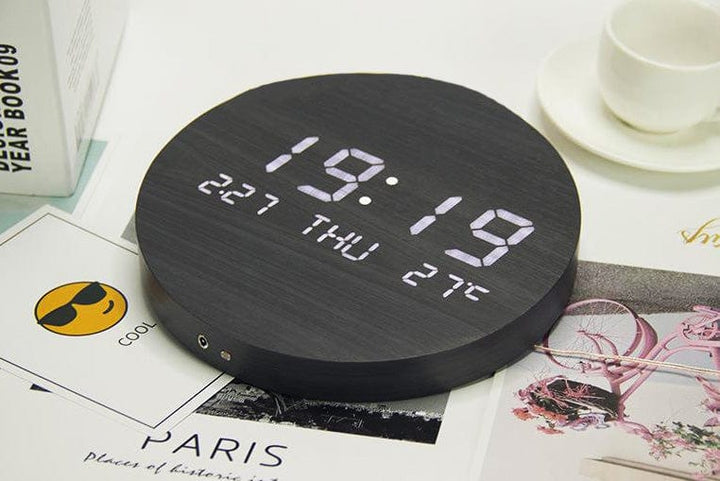 Contemporary Scandinavian digital wall clock, battery operated, ideal for sleek wall decor in any modern home.