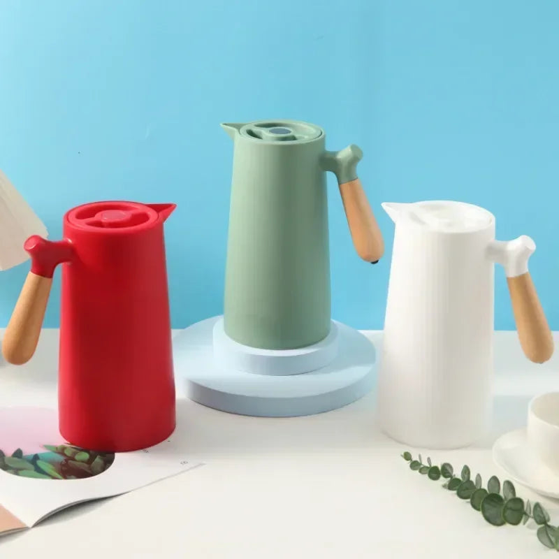 Leak-proof, reusable NordicTherm insulated bottle for hot coffee or cold water, ideal for travel & daily hydration.