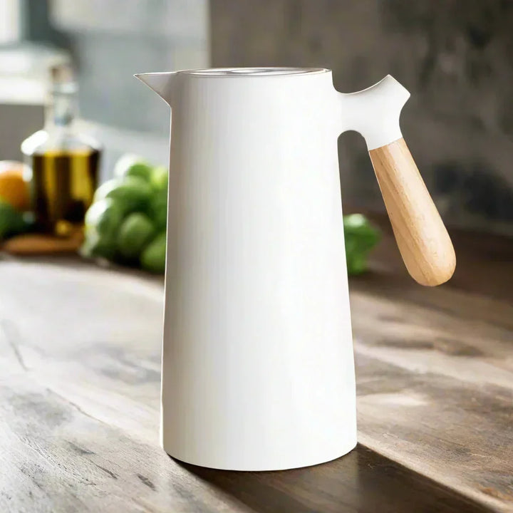 Durable & reusable NordicTherm stainless steel thermal flask for hot coffee or cold water, an eco-friendly travel mug.