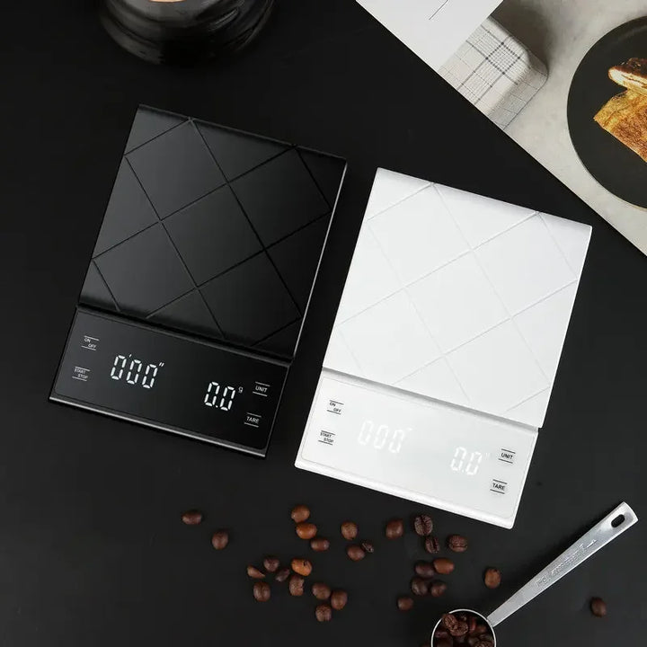 Sleek silver digital kitchen scale with large LCD, perfect for precise baking & cooking measurements in any home kitchen.