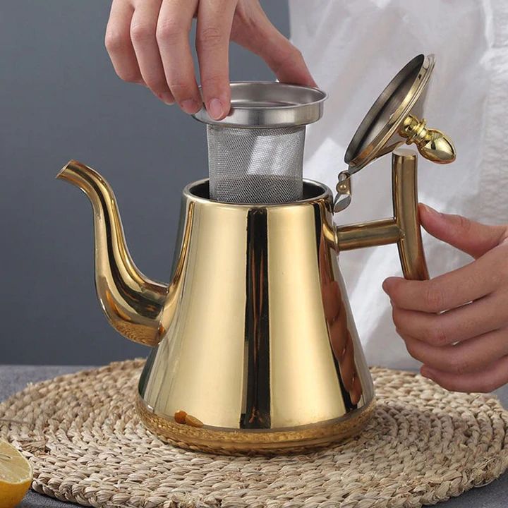 Durable stainless steel stovetop induction kettle with integrated filter, ideal for modern kitchen coffee.
