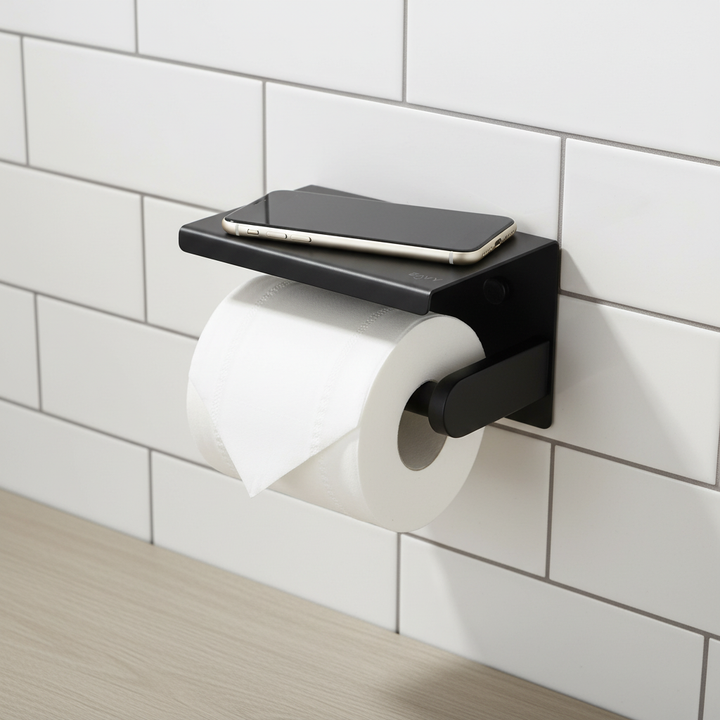 Sleek stainless steel wall-mounted toilet paper holder with top shelf, modern bathroom accessory