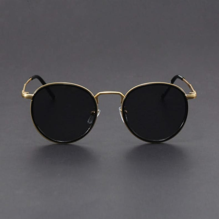 Contemporary sleek metal frame sunglasses, unisex, combining fashion with crucial UV and anti-glare benefits.