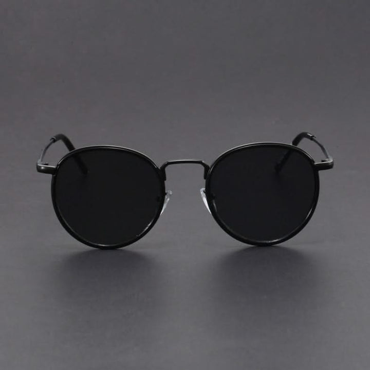 Durable sleek metal frame sunglasses, unisex design, offering anti-glare lenses and comprehensive UV protection.