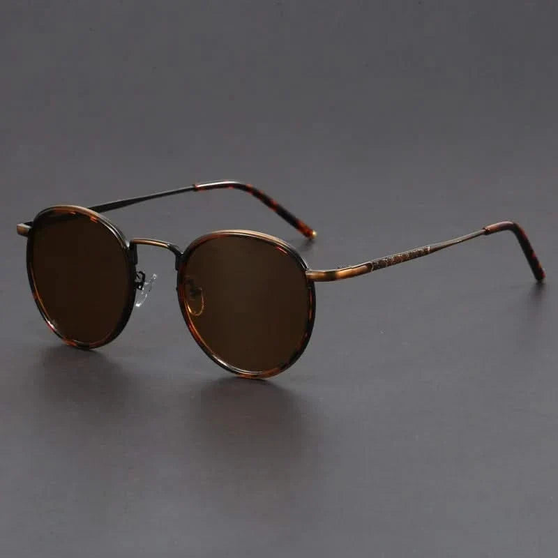 Lightweight sleek metal frame sunglasses, unisex accessory, providing superior UV protection and anti-glare.