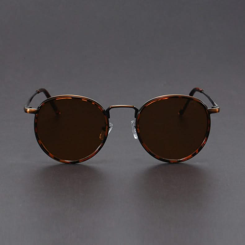 Premium unisex metal frame sunglasses, stylish and durable, with essential UV protection and anti-glare lenses.