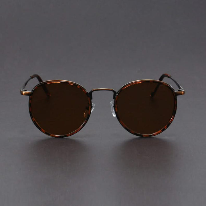Premium unisex metal frame sunglasses, stylish and durable, with essential UV protection and anti-glare lenses.